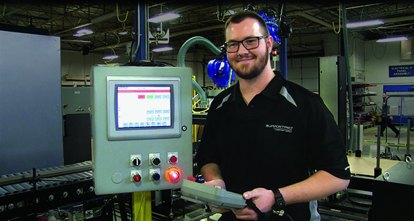 Controls technician smiling